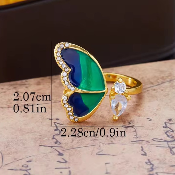 Anthropologie Gold Ring with Blue and White Butterfly Design - Picture 5 of 7